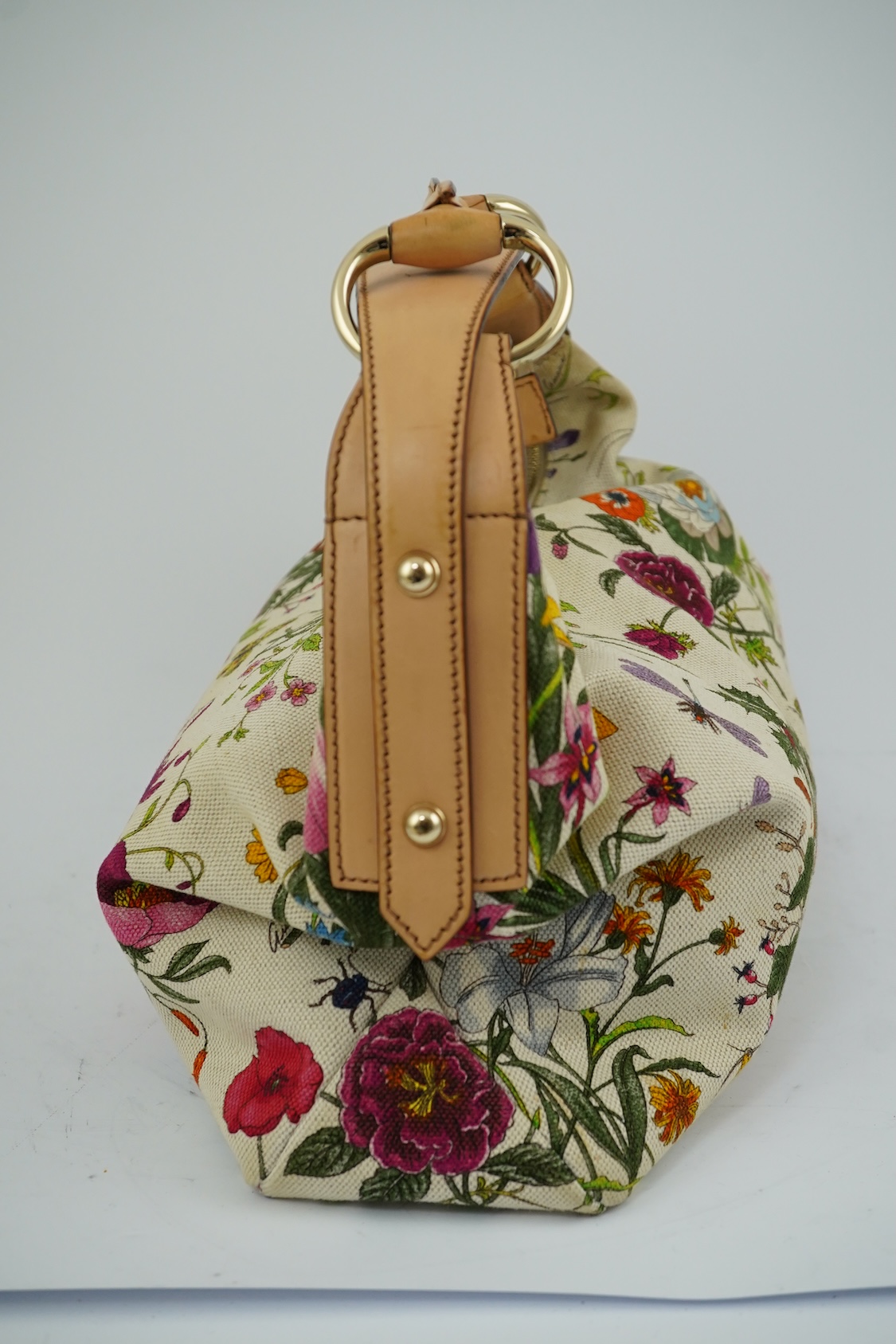 A Gucci flora canvas horse-bit hobo bag with dust bag